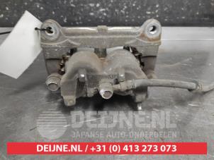 Mitsubishi Outlander Front brake calliper, left O697302 photo 2
