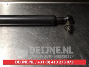 Subaru Impreza Gasdemper links-achter O293861 foto 3