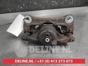 Mazda 3 Front brake calliper, left O697654 photo 2