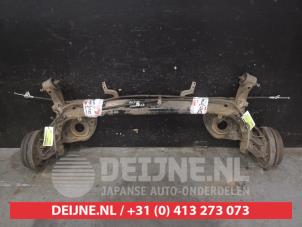 Gebruikte Achteras voorwielaandrijving Nissan Note (E12) 1.2 DIG-S 98 Prijs € 150,00 Margeregeling aangeboden door V.Deijne Jap.Auto-onderdelen BV