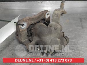 Gebruikte Remklauw (Tang) links-achter Honda Civic (EP/EU) 1.4 16V Prijs € 25,00 Margeregeling aangeboden door V.Deijne Jap.Auto-onderdelen BV