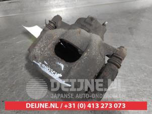Toyota Aygo Bremszange links vorne O697951 foto 2