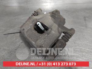 Toyota Aygo Front brake calliper, right O697952 photo 2