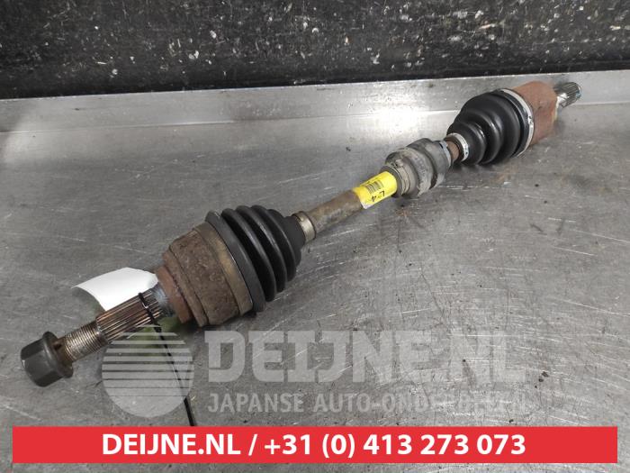 Nissan Micra Aandrijfas links-voor O698646