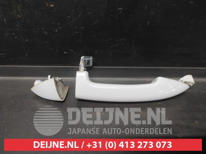 Kia Venga Rear door handle 4-door, left O699269