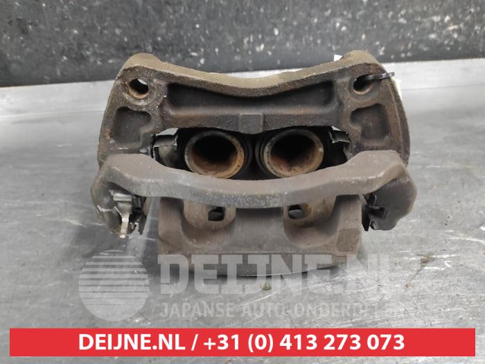 Nissan Qashqai+2 Remklauw (Tang) links-voor O700073