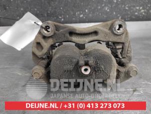 Nissan Qashqai+2 Front brake calliper, left O700073 photo 2