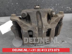 Nissan Qashqai+2 Front brake calliper, left O700073 photo 3