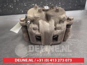 Mitsubishi Pajero Bremszange links vorne O700254 foto 3