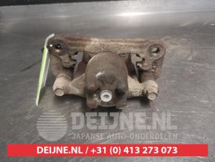 Mitsubishi Pajero Bremszange links hinten O700256 foto 2