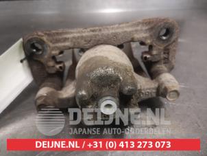 Mitsubishi Pajero Bremszange rechts hinten O700257 foto 2