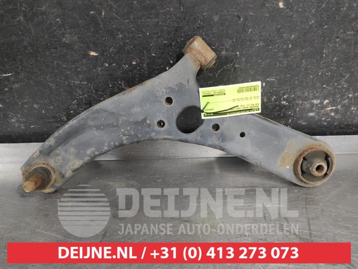 Kia Rio Draagarm onder links-voor O700862