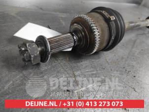 Kia Rio Aandrijfas rechts-voor O701107 foto 3