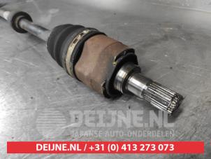 Kia Rio Aandrijfas rechts-voor O701107 foto 2