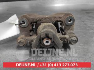 Kia Rio Remklauw (Tang) rechts-achter O701113 foto 2