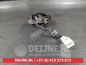 Toyota Yaris Schakelaar achterklep O701118 foto 2