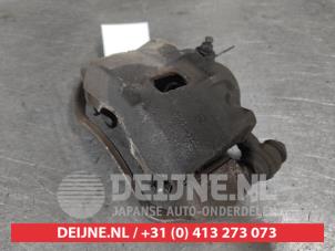 Hyundai I10 Bremszange rechts vorne O701415 foto 2
