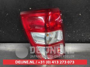 Gebruikte Achterlicht links Suzuki Grand Vitara II (JT) 2.0 16V Prijs op aanvraag aangeboden door V.Deijne Jap.Auto-onderdelen BV