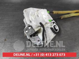 Mazda 3 Front door lock mechanism 4-door, right O702028 photo 2