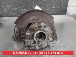 Daihatsu Sirion Achsschenkel links vorne O702407 foto 2