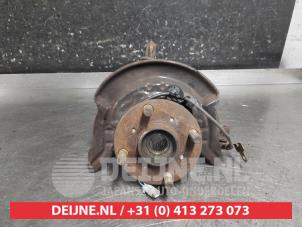 Daihatsu Sirion Achsschenkel rechts vorne O702408 foto 2