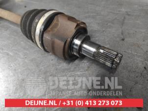 Hyundai I20 Aandrijfas links-voor O702656 foto 2