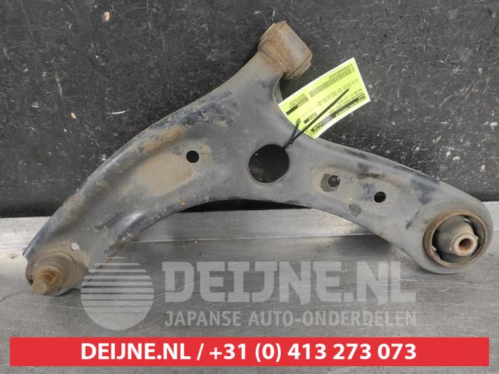 Kia Rio Draagarm onder links-voor O703220