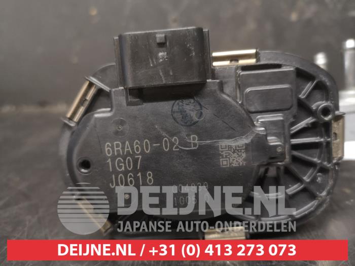 Gasklephuis van een Nissan Qashqai (J12) 1.5 E-Power 16V 2022