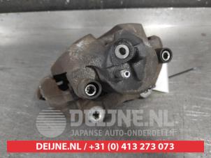Mazda 3 Bremszange links vorne O703596 foto 3