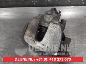 Mazda 3 Bremszange links vorne O703596 foto 2