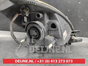 Nissan Note Scheinwerfer links O703679 foto 2