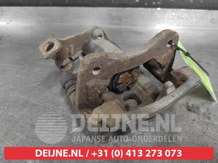 Kia Carens Remklauw (Tang) links-achter O703866