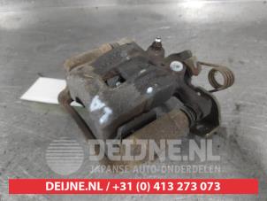 Kia Carens Bremszange links hinten O703866 foto 2