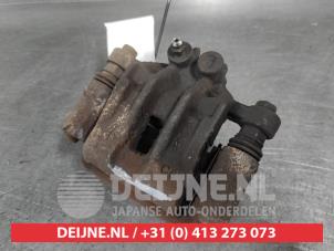 Kia Ceed Remklauw (Tang) links-achter O704195 foto 2