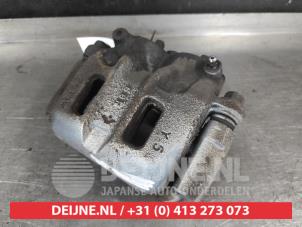 Mitsubishi Grandis Bremszange links vorne O704330 foto 2