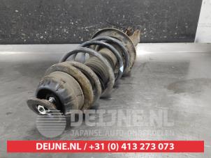 Toyota Yaris Stoßdämpferstrebe links vorne O704449 foto 2