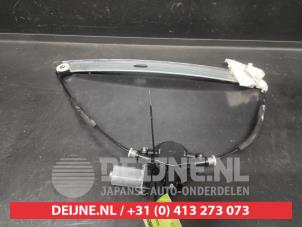 Mazda 2 Fenstermechanik 4-türig links vorne O705172 foto 2