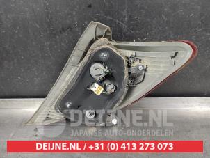 Toyota Yaris Rücklicht links O706421 foto 2