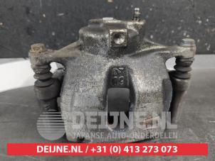 Toyota Corolla Bremszange links vorne O706742 foto 3