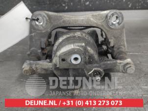 Toyota Corolla Bremszange links vorne O706742 foto 2