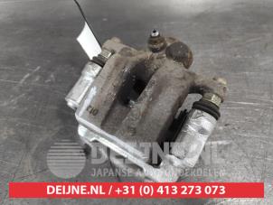 Kia Sportage Bremszange links hinten O707300 foto 2