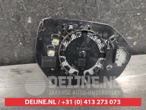 Toyota Yaris Spiegelglas links O707490 foto 2