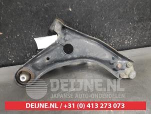Toyota Yaris Querlenker unten links vorne O707539 foto 2