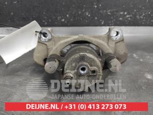 Toyota Yaris Front brake calliper, right O707543 photo 2