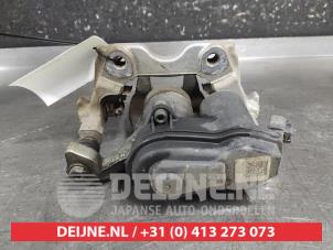 Toyota Yaris Rear brake calliper, left O707544 photo 2