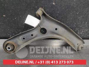 Kia Rio Querlenker unten links vorne O708655 foto 2