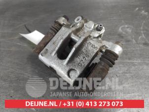 Toyota Corolla Rear brake calliper, left O709777 photo 2