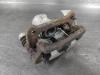 Toyota Corolla (E12) 1.6 16V VVT-i Remklauw (Tang) links-achter