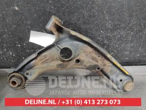 Toyota Yaris Querlenker unten links vorne O709983 foto 2