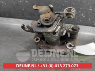 Mitsubishi Colt Bremszange links hinten O710247 foto 3